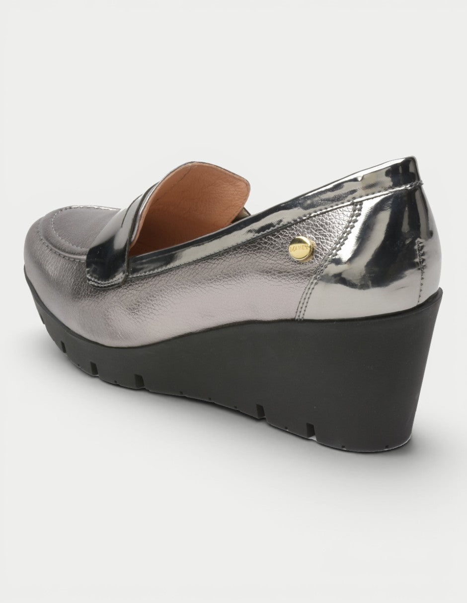 Mocasín Fiorella 05 inox con cuña Manet, vista lateral trasera