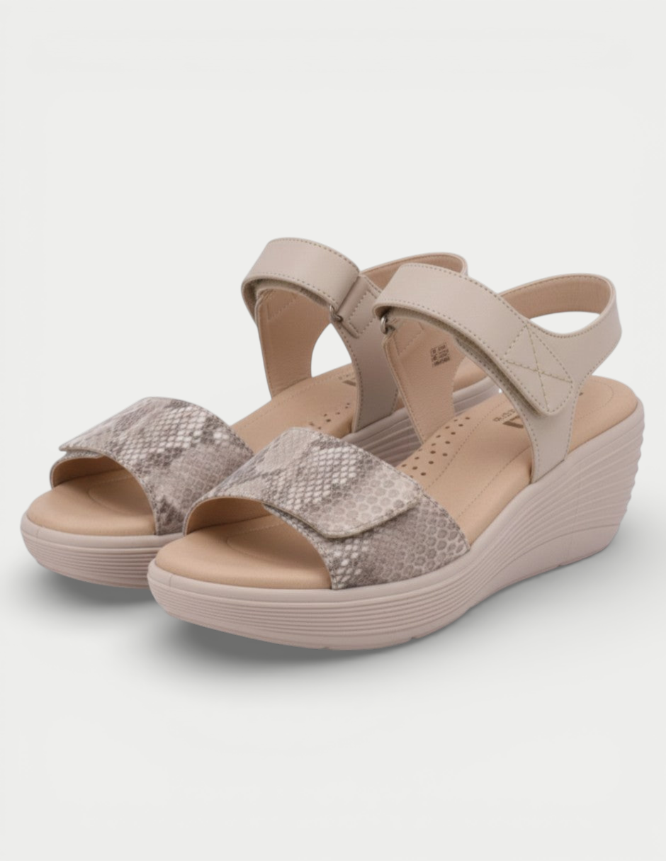 Manet Bella 01 beige snake print wedge sandals with adjustable straps and ergonomic platform for all-day comfort.