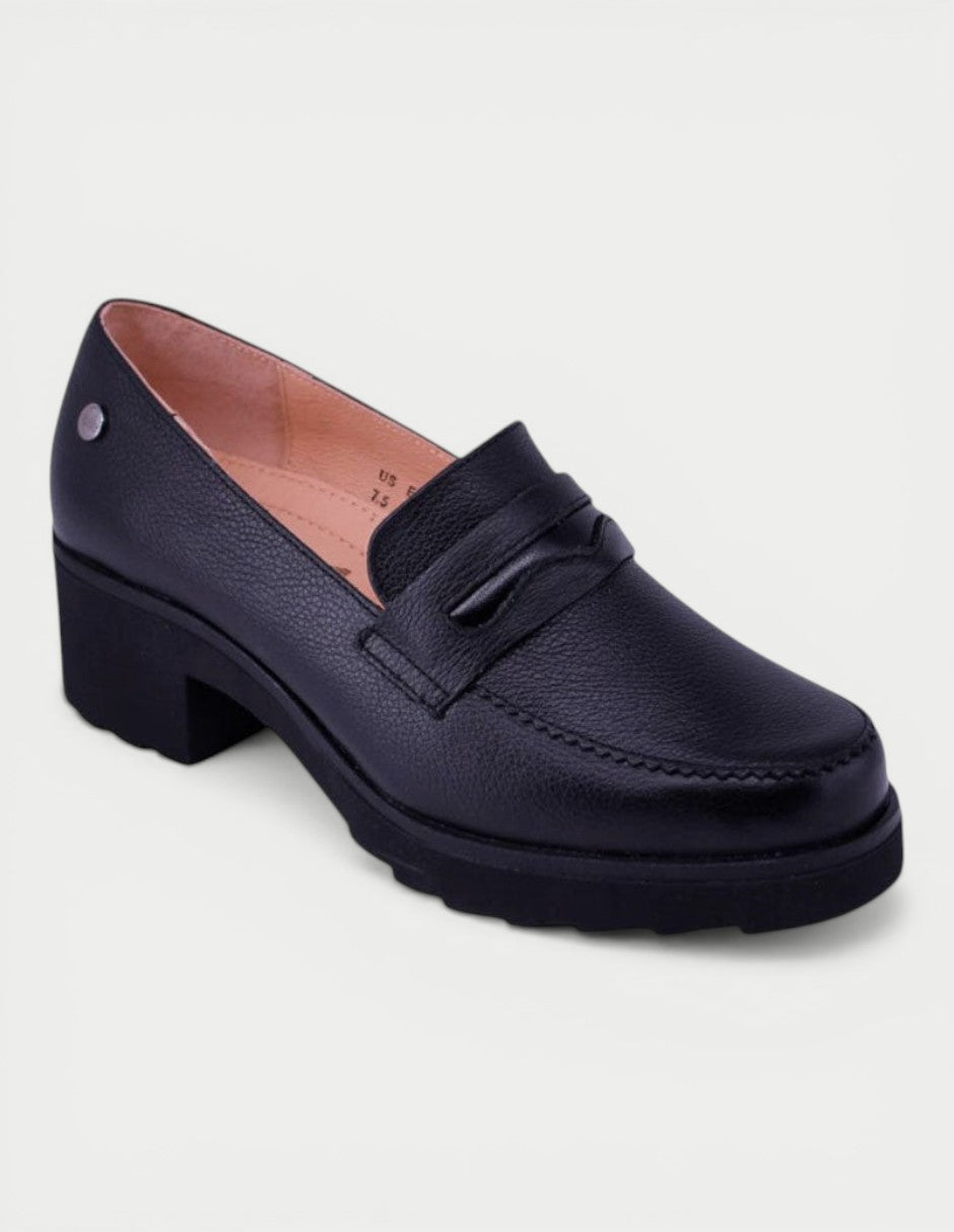 Manet black leather loafer with block heel and decorative strap detail. Classic style for women.
