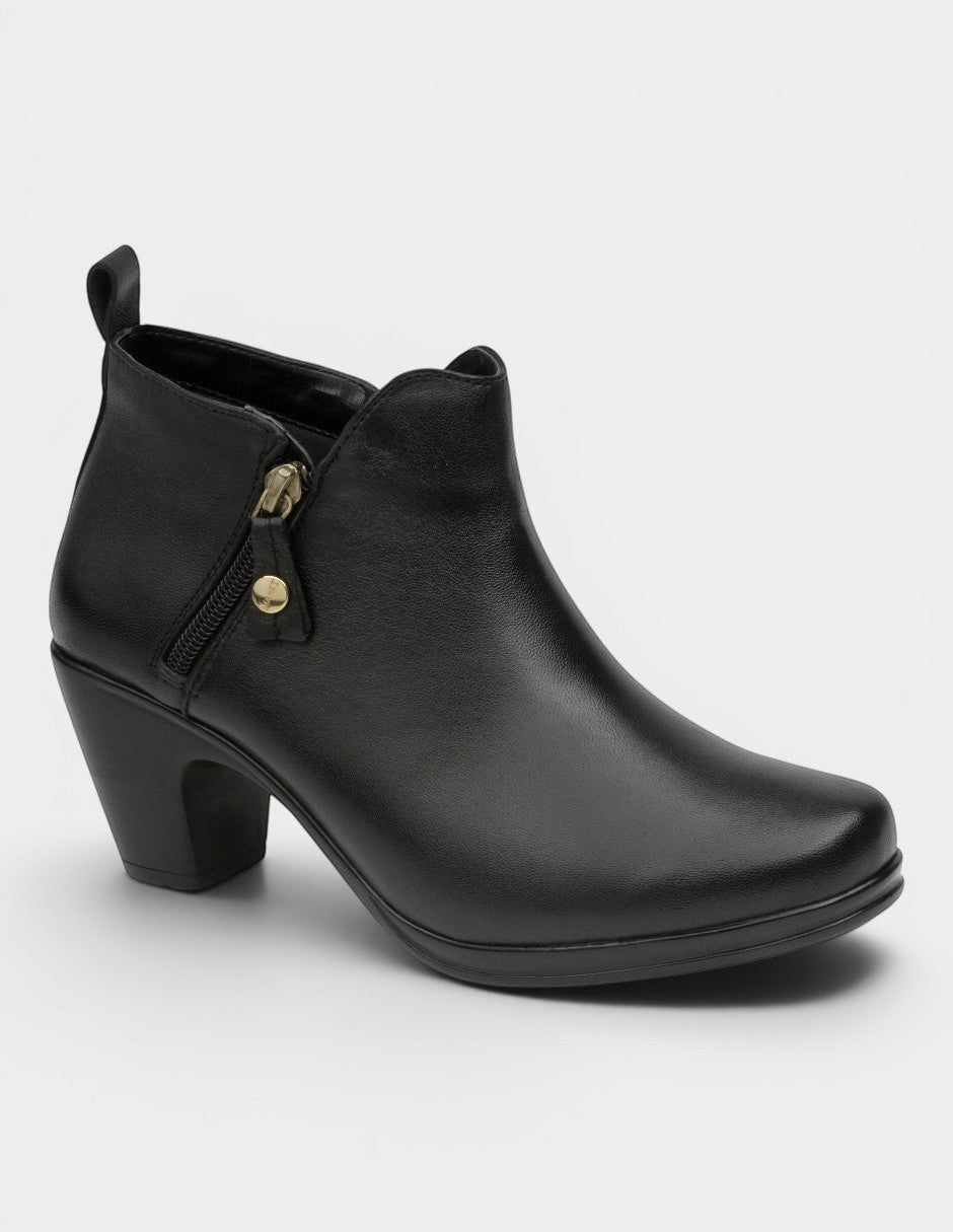 Bota Alexa 01 de cuero negro de Manet con cremallera dorada y tacón grueso.
