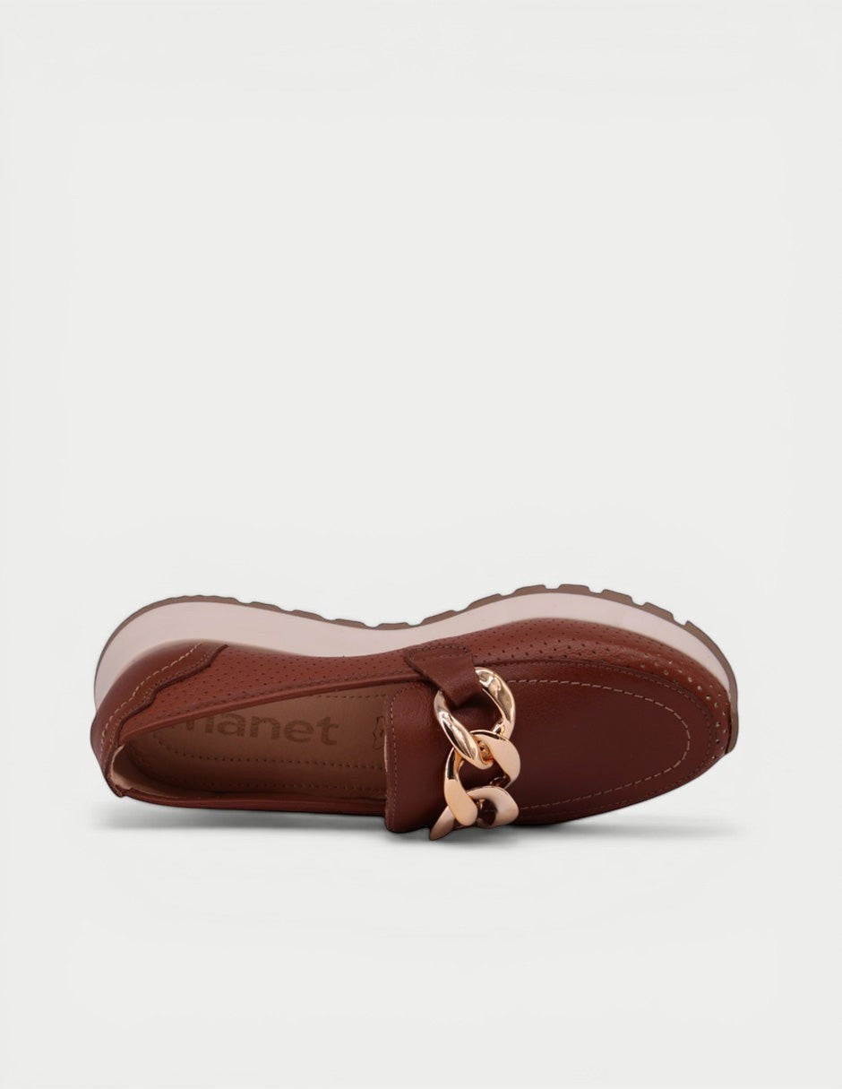 Manet brown perforated leather loafers with elevated sole and gold chain detail.