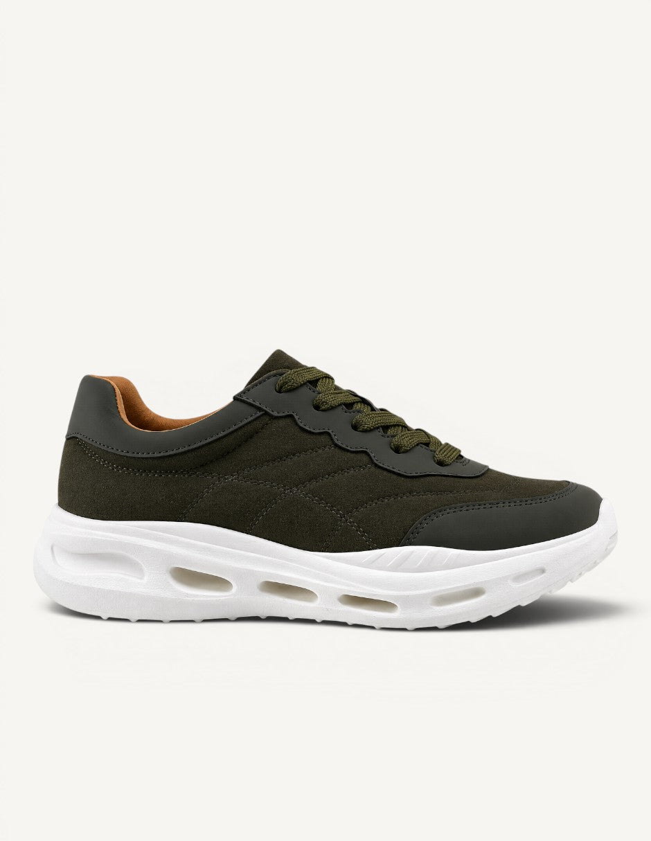 Tenis Manet Ro 02 en color verde militar con suela blanca gruesa, diseño ligero y materiales flexibles.